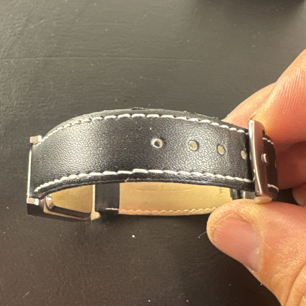 Paul Frank Julius square watch with black dial, stainless steel case, and black leather strap