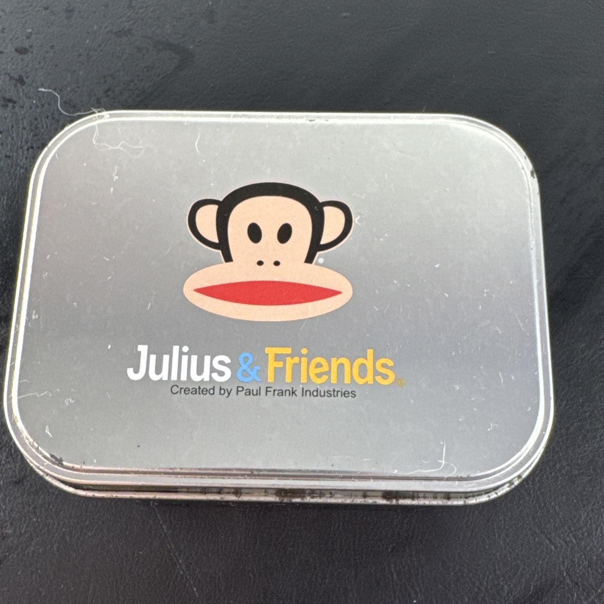 Paul Frank Julius square watch with black dial, stainless steel case, and black leather strap