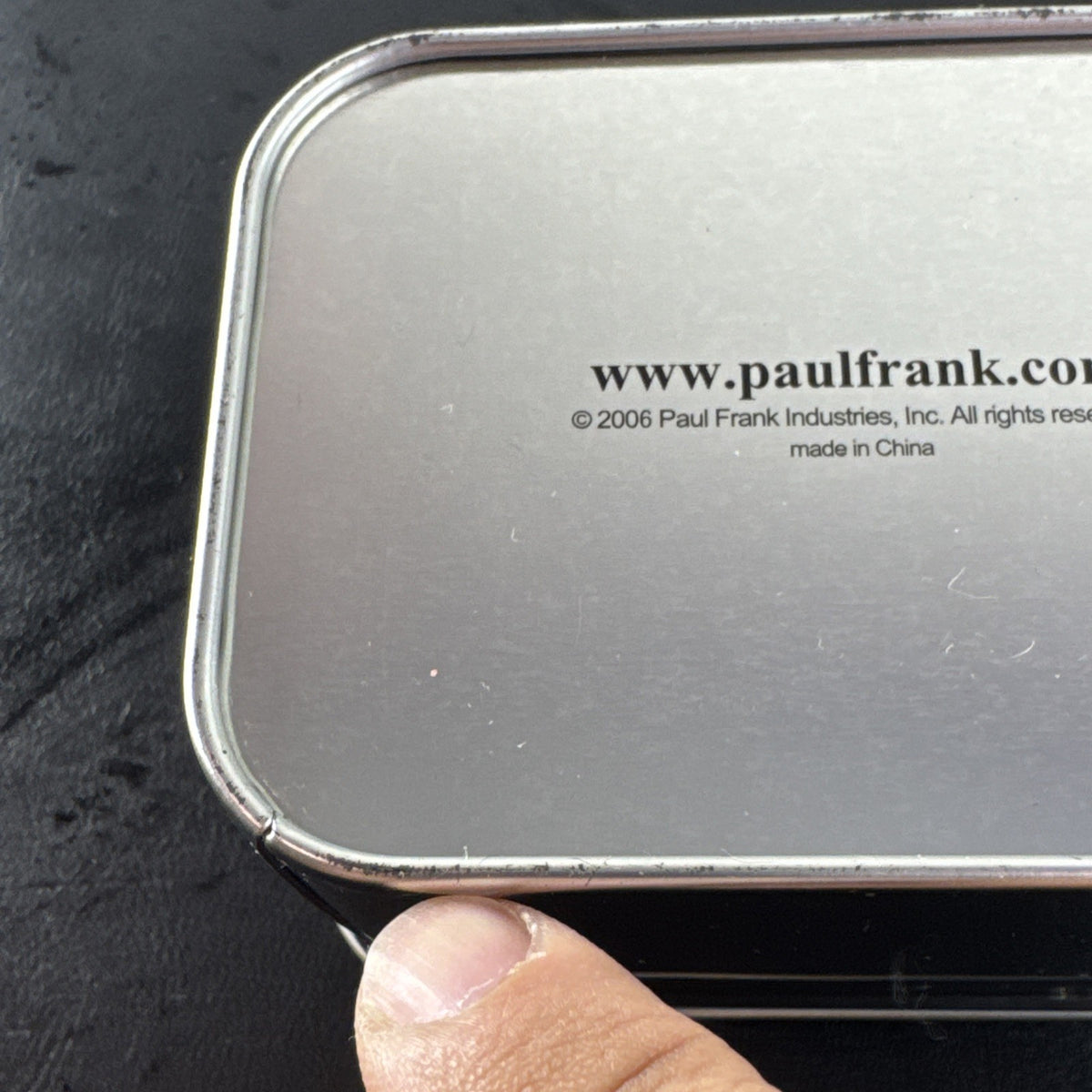 Paul Frank Julius square watch with black dial, stainless steel case, and black leather strap