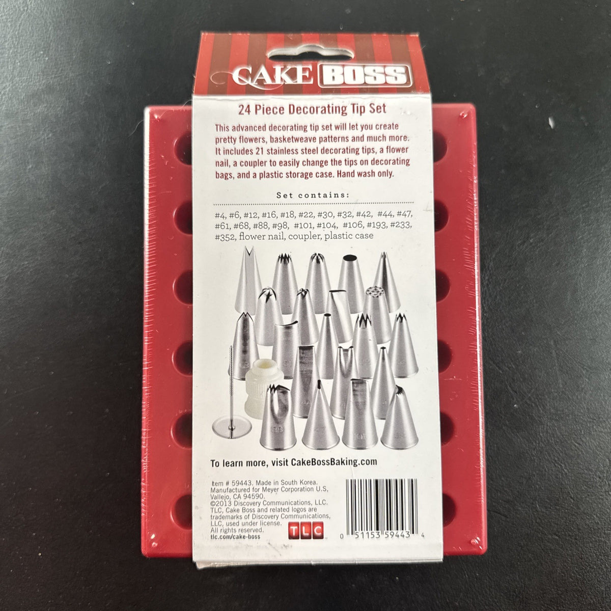 Cake Boss 24-piece stainless steel cake decorating tip set with plastic storage case, brand new.