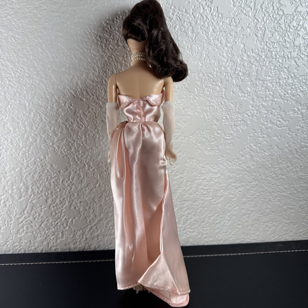 1990 Barbie Enchanted Evening Remake fashion doll featuring a colorful vintage gown design