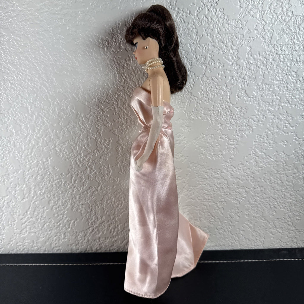 1990 Barbie Enchanted Evening Remake fashion doll featuring a colorful vintage gown design