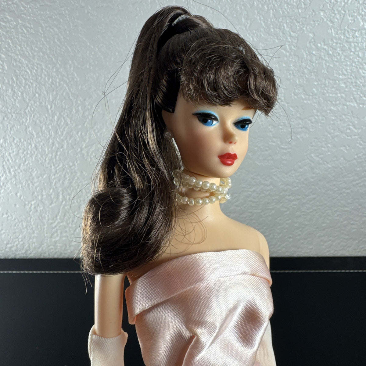 1990 Barbie Enchanted Evening Remake fashion doll featuring a colorful vintage gown design