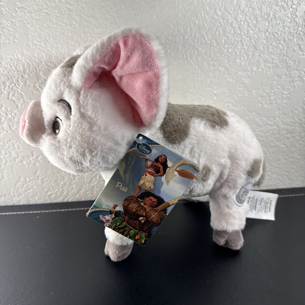 Official Disney Store 10-inch standing Pua pig plush from Moana with original tags attached.