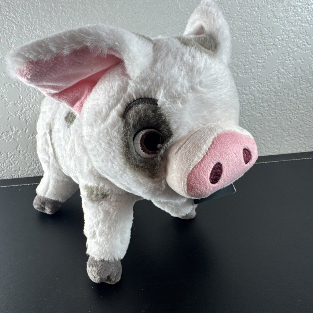 Official Disney Store 10-inch standing Pua pig plush from Moana with original tags attached.