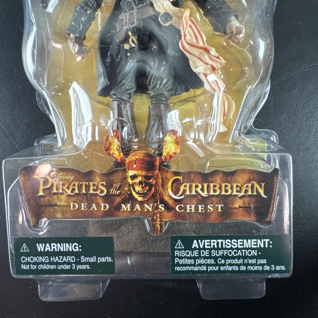 New 2006 Disney Pirates of the Caribbean Dead Man's Chest 7-inch Captain Jack Sparrow action figure with accessories.