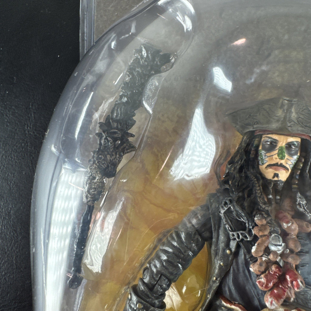 New 2006 Disney Pirates of the Caribbean Dead Man's Chest 7-inch Captain Jack Sparrow action figure with accessories.