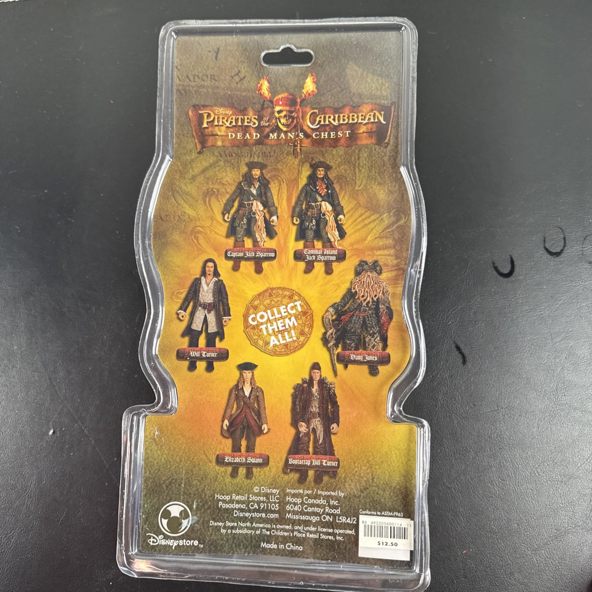 New 2006 Disney Pirates of the Caribbean Dead Man's Chest 7-inch Captain Jack Sparrow action figure with accessories.