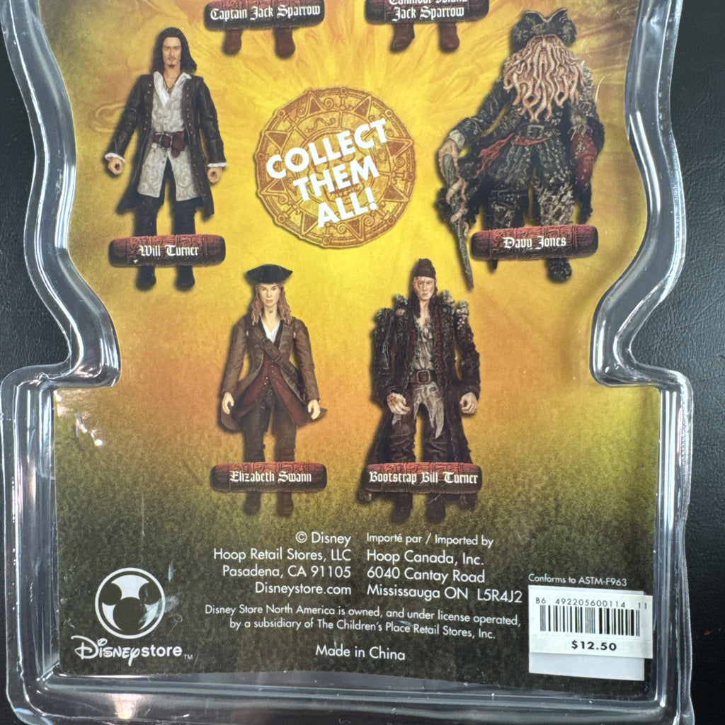 New 2006 Disney Pirates of the Caribbean Dead Man's Chest 7-inch Captain Jack Sparrow action figure with accessories.