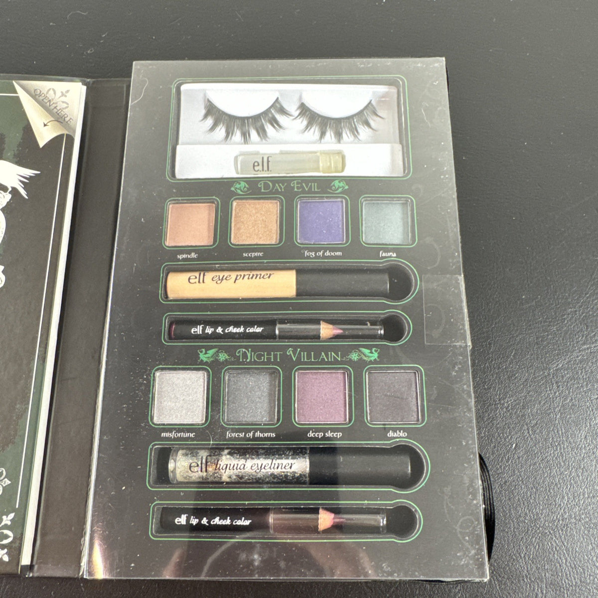 New e.l.f. Disney Maleficent Sinister Smoky Eyes Makeup Book containing eyeshadow, face powder, highlighter, and lip gloss
