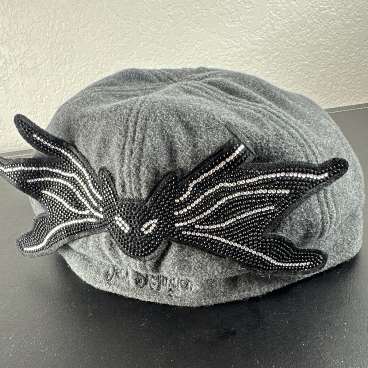 Brand new Disney Parks gray Jack Skellington hat with rhinestone bat design and original tags