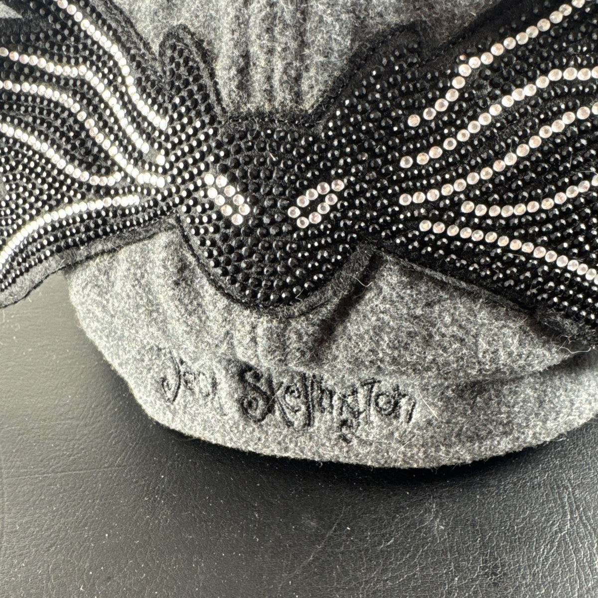 Brand new Disney Parks gray Jack Skellington hat with rhinestone bat design and original tags