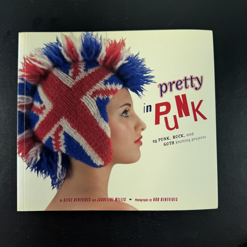 Cover of Pretty in Punk 25 Punk Rock and Goth Knitting Projects paperback book by Chronicle Books