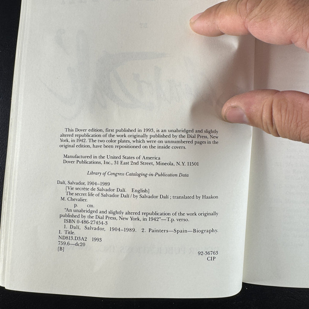 Front cover of The Secret Life of Salvador Dalí unabridged paperback book published by Dover Publications