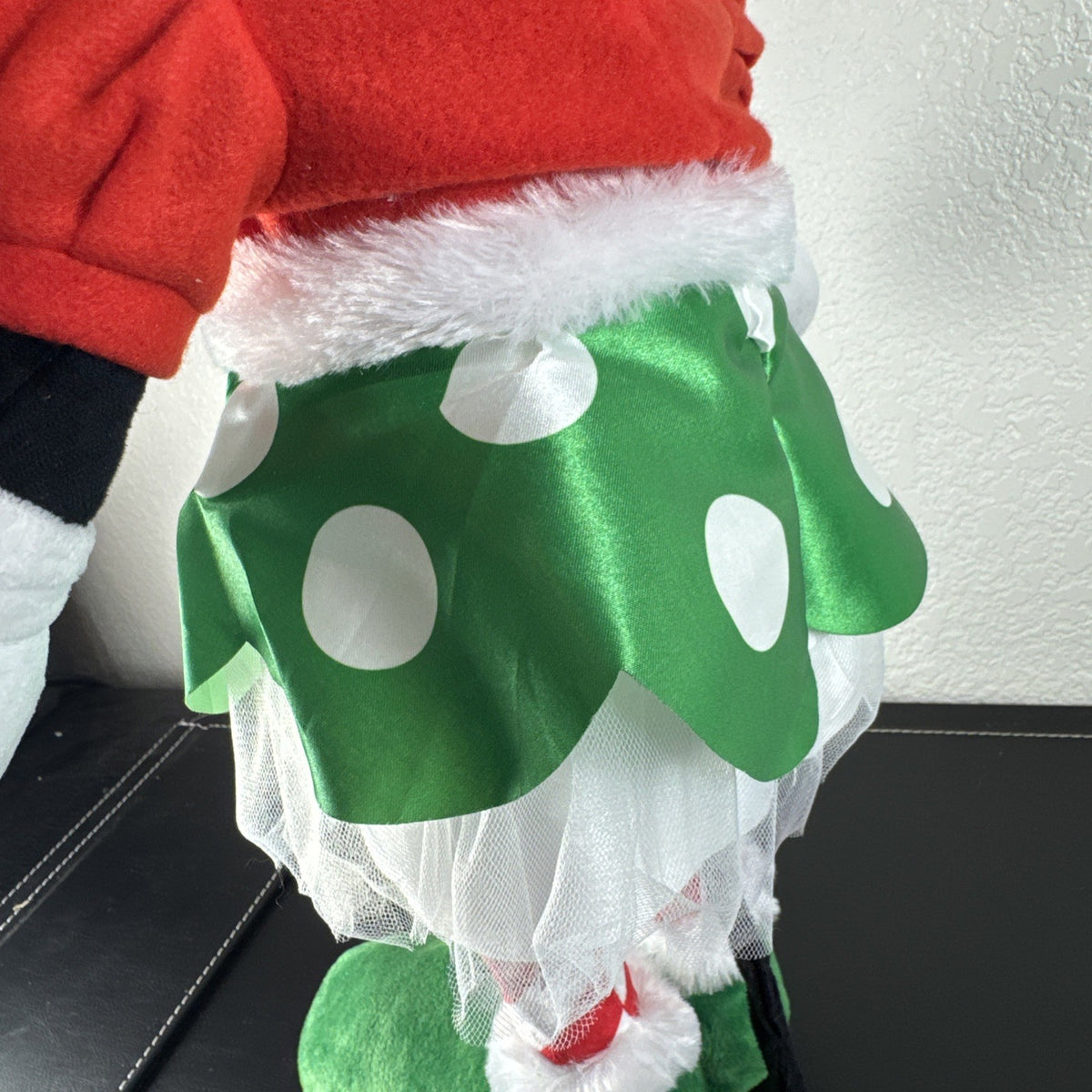 Disney 24-inch Minnie Mouse Christmas plush greeter dressed in a red and green elf costume