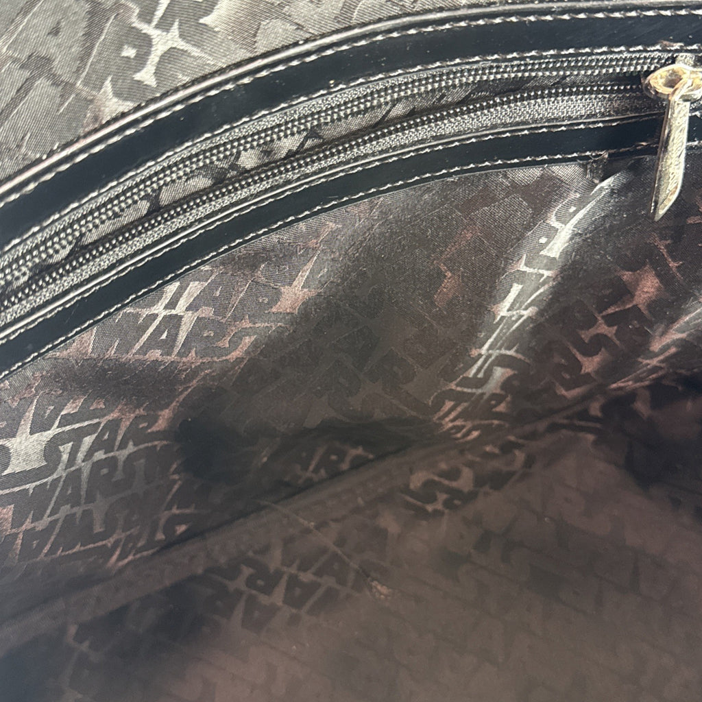Loungefly Star Wars Darth Vader embossed black patent faux leather dome satchel bag showing logo plaque and double handles