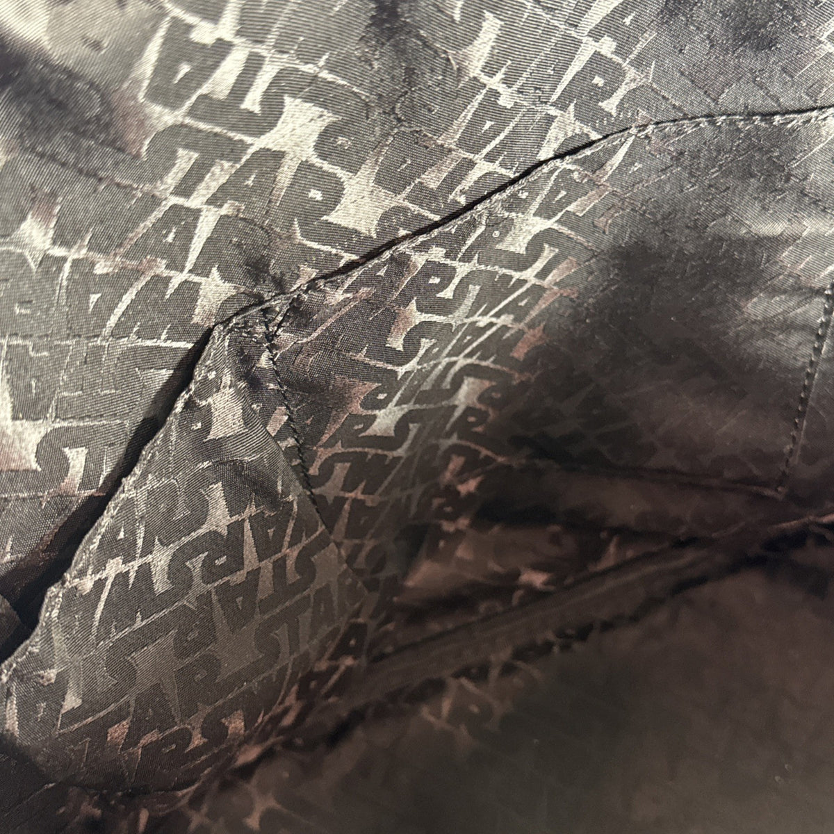 Loungefly Star Wars Darth Vader embossed black patent faux leather dome satchel bag showing logo plaque and double handles