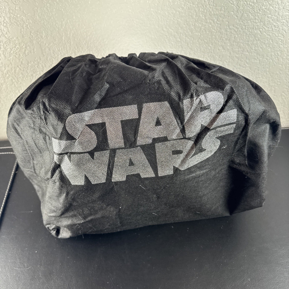 Loungefly Star Wars Darth Vader embossed black patent faux leather dome satchel bag showing logo plaque and double handles