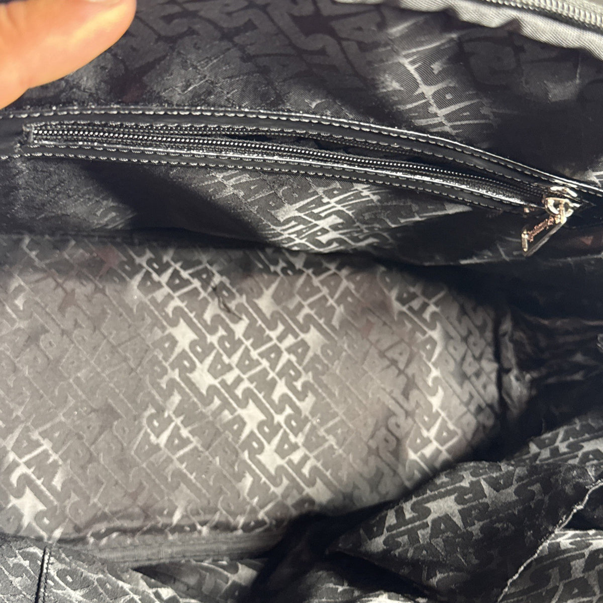 Loungefly Star Wars Darth Vader embossed black patent faux leather dome satchel bag showing logo plaque and double handles