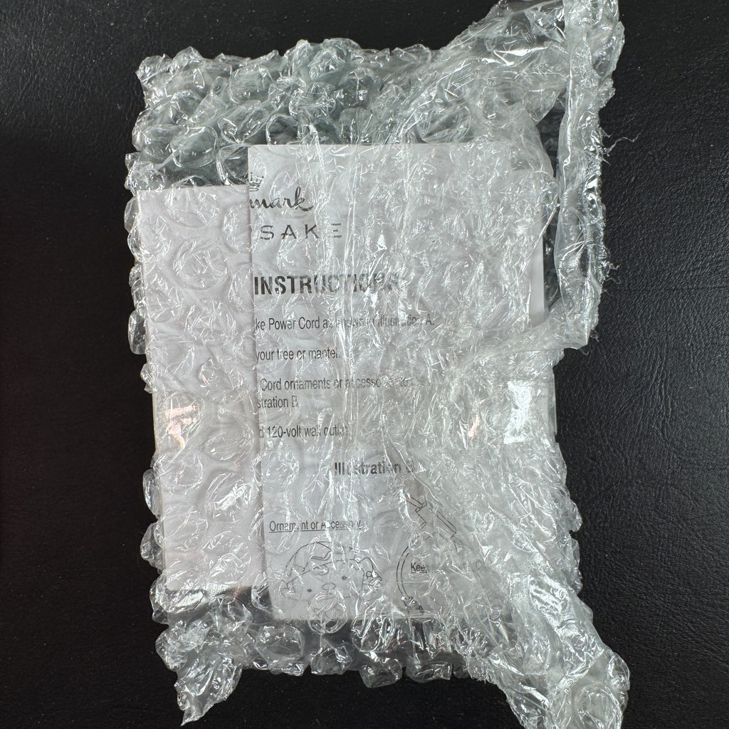 Hallmark Keepsake Power Cord adapter brand new in its original red packaging box for interactive Christmas ornaments.
