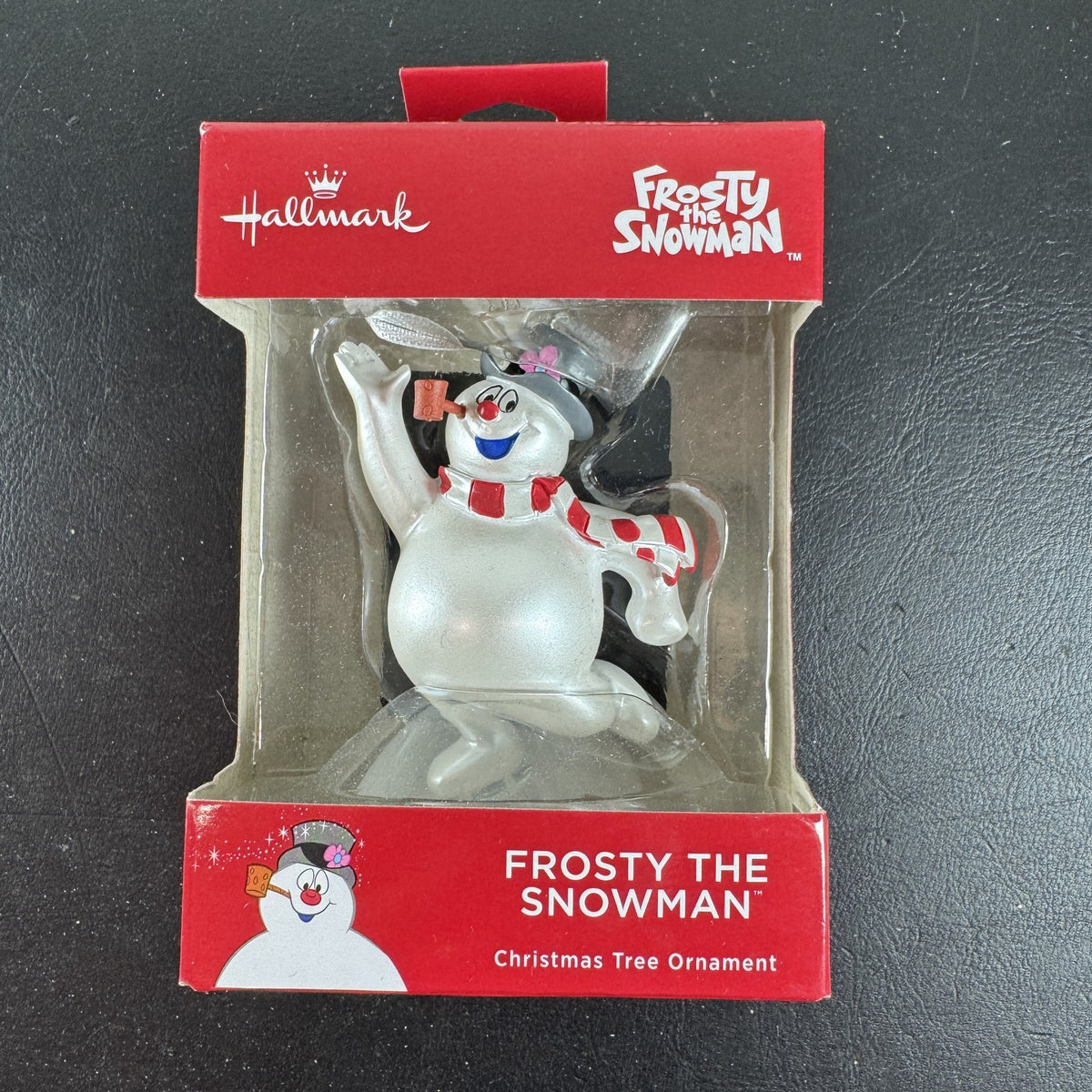Hallmark 2018 Frosty the Snowman Christmas ornament featuring top hat and scarf in original packaging