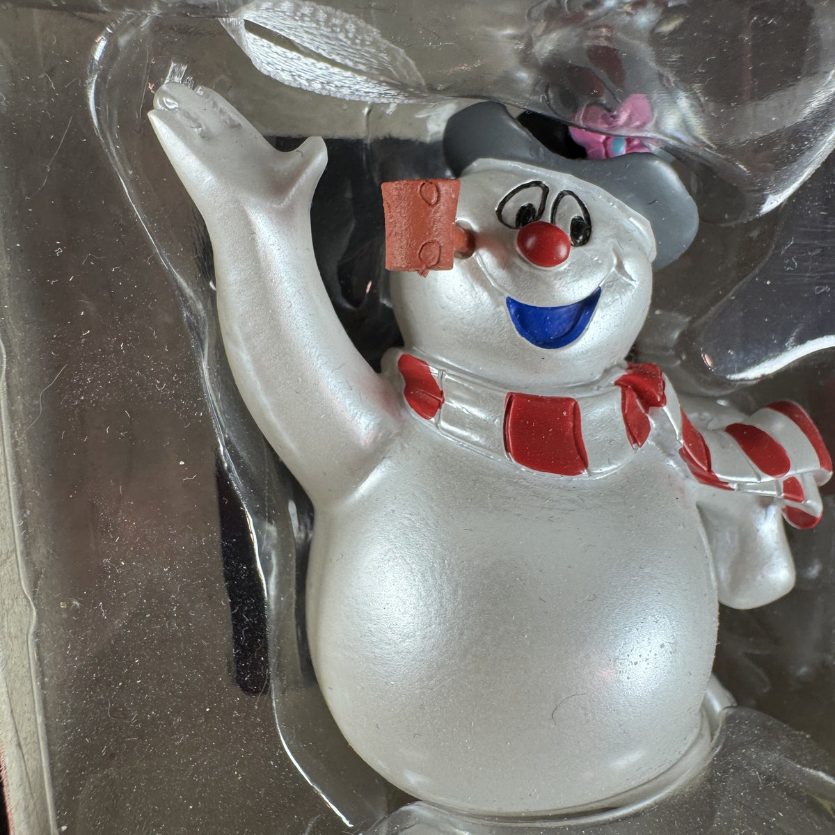 Hallmark 2018 Frosty the Snowman Christmas ornament featuring top hat and scarf in original packaging