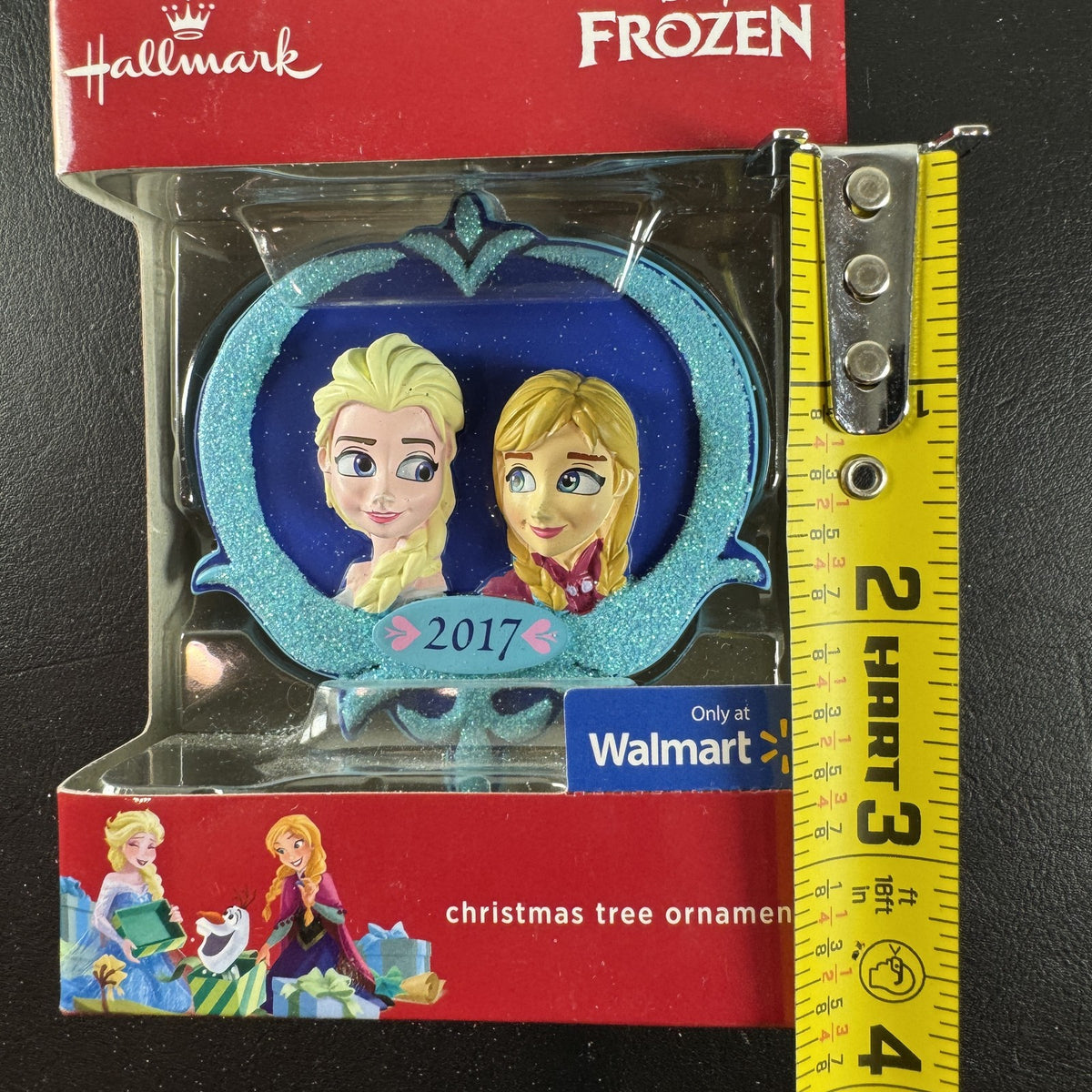 2017 Hallmark Disney Frozen Elsa and Anna Christmas tree ornament in original packaging.