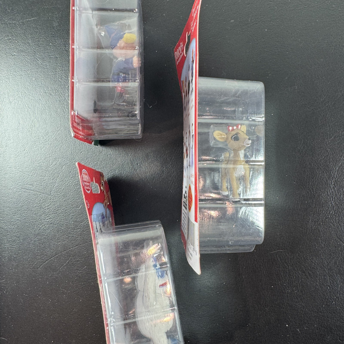 Sealed Rudolph the Red-Nosed Reindeer mini figures set of 3 including Hermey, Clarice, and Bumble.