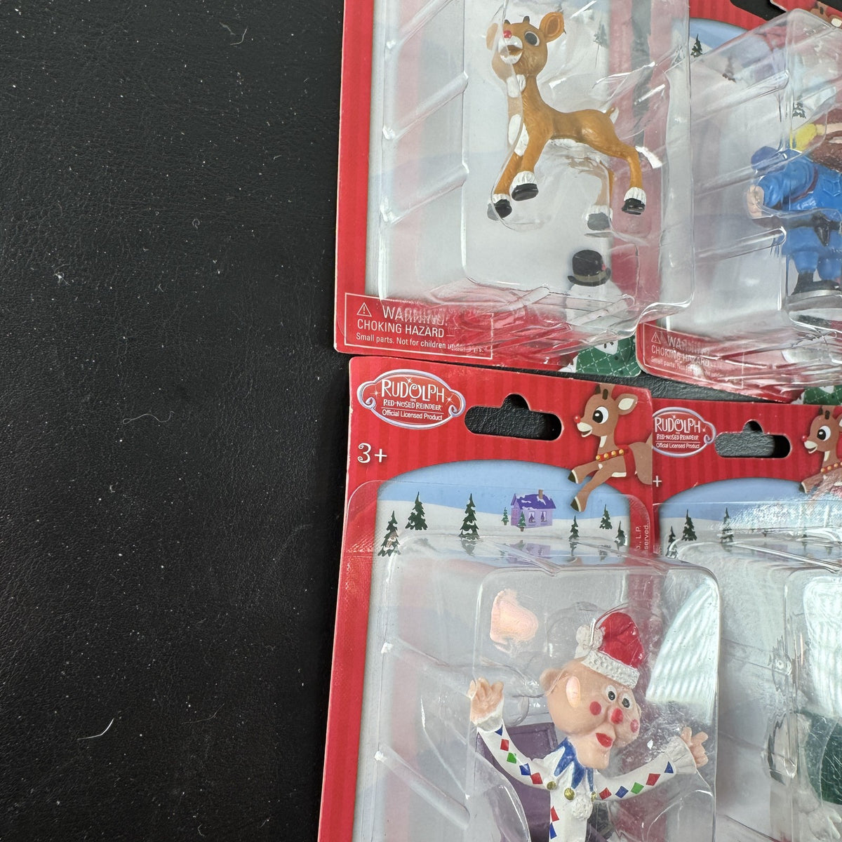 Character Arts Rudolph the Red-Nosed Reindeer set of 4 sealed mini figures including Yukon Cornelius and Sam the Snowman.