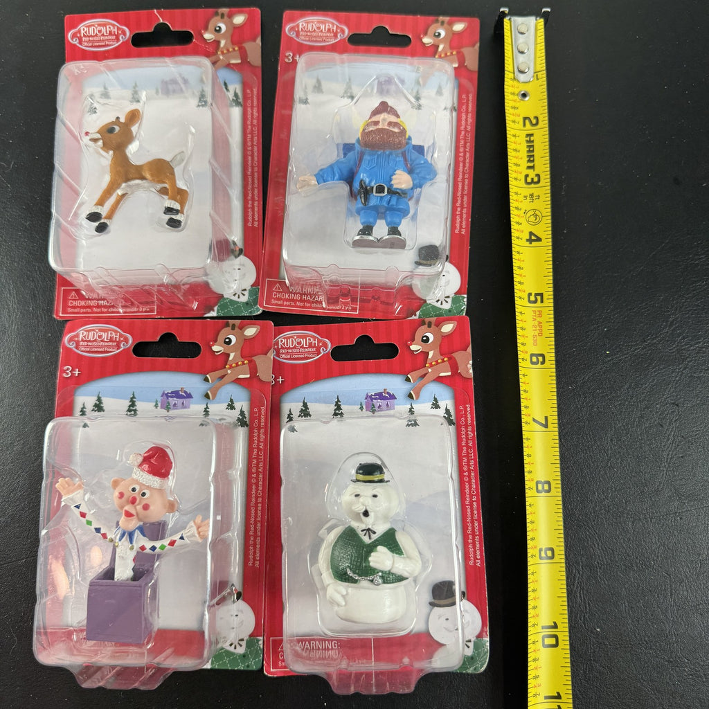 Character Arts Rudolph the Red-Nosed Reindeer set of 4 sealed mini figures including Yukon Cornelius and Sam the Snowman.