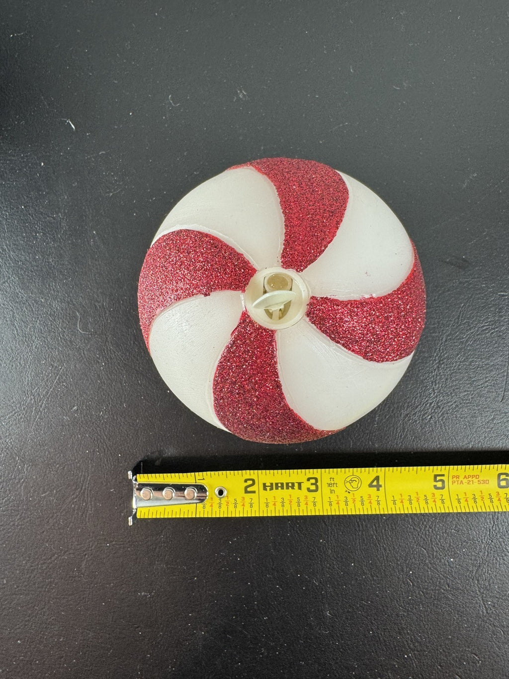 Luminara 3.5x4.5 red glitter swirl sphere real wax flameless LED candle in original packaging.