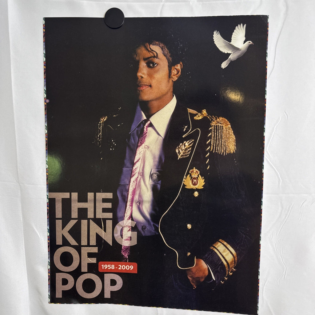 Michael Jackson 2009 memorial tribute promo poster featuring portrait in military jacket and white dove graphic.