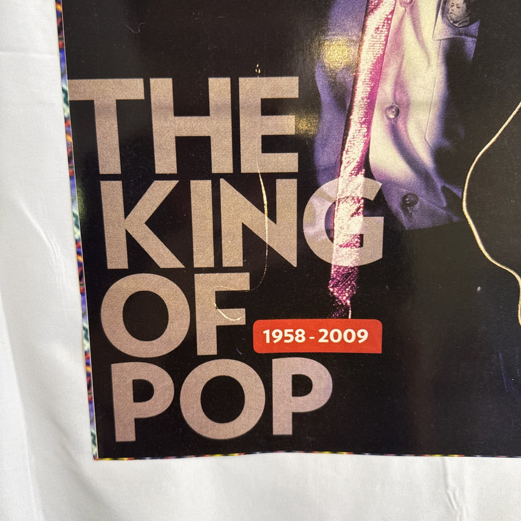 Michael Jackson 2009 memorial tribute promo poster featuring portrait in military jacket and white dove graphic.