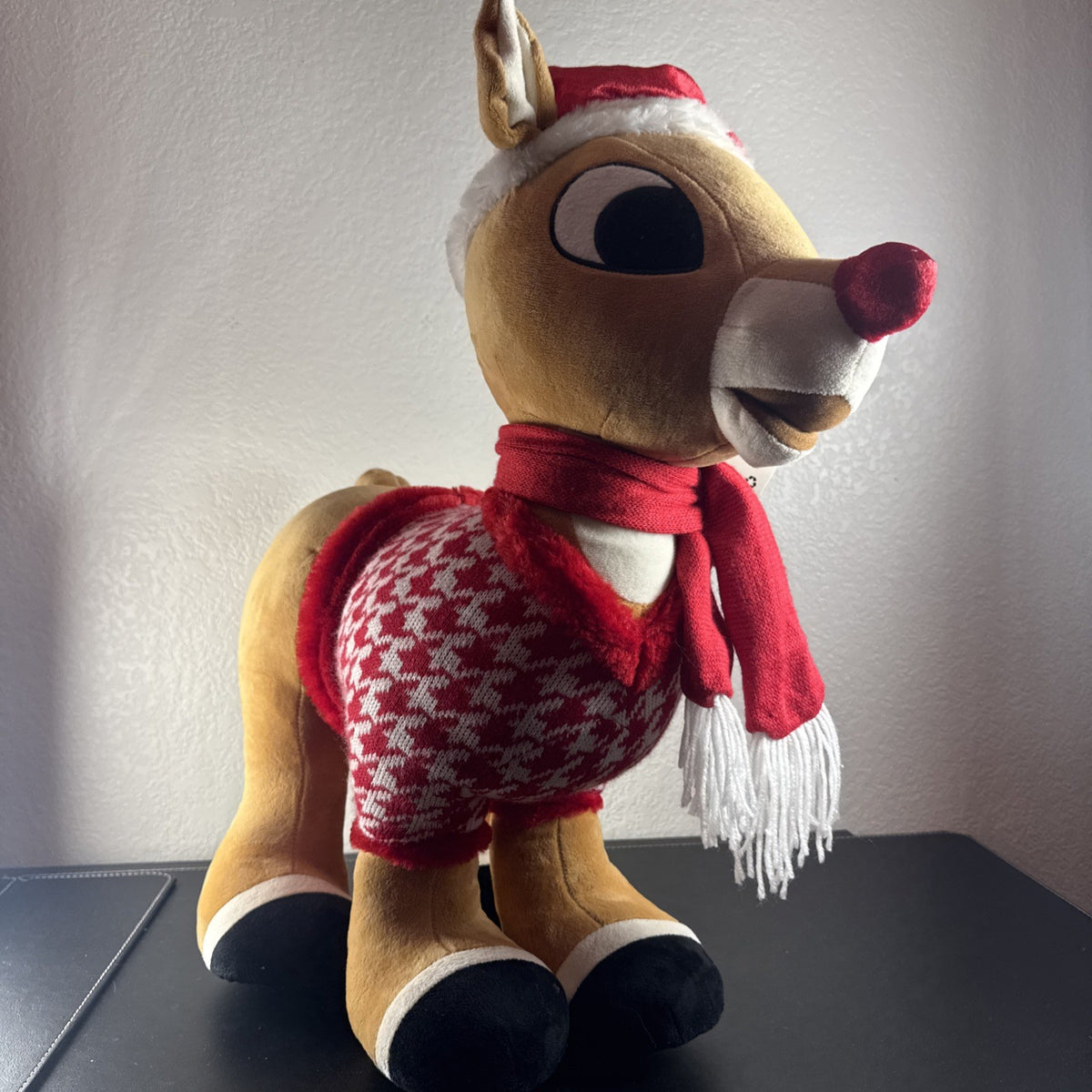 NWT 2016 Gemmy 22-inch Rudolph the Red-Nosed Reindeer standing plush door greeter wearing a houndstooth sweater.