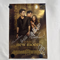 Original 2009 Twilight New Moon promotional 11x17 poster signed in silver marker by cast members.