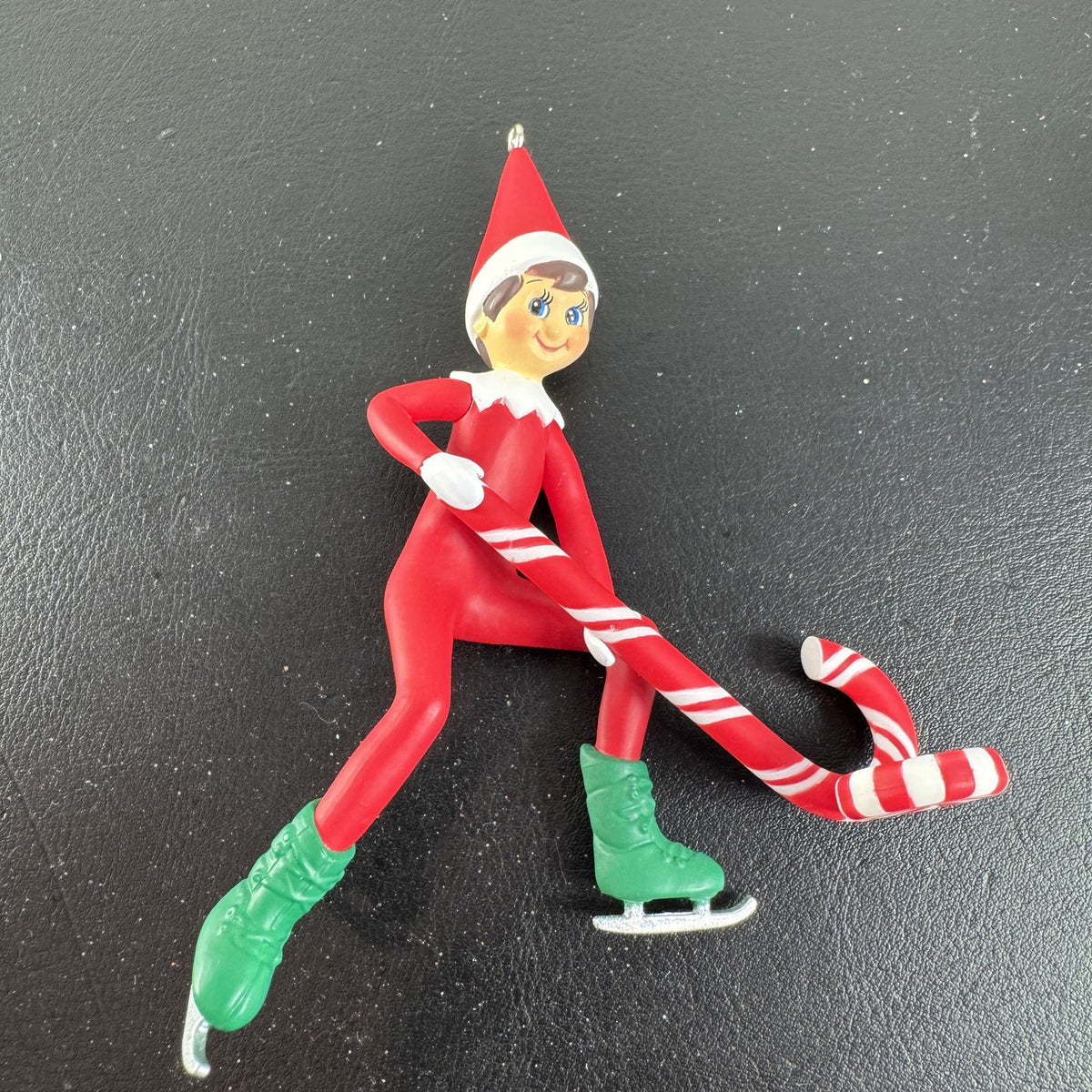Hallmark Keepsake 2021 Elf on the Shelf ice skating Christmas ornament holding a peppermint candy cane in original box