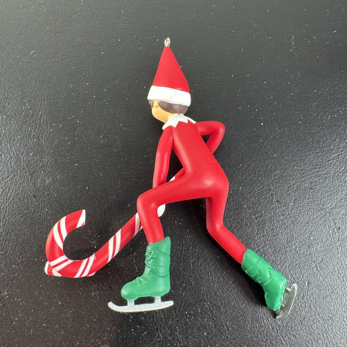 Hallmark Keepsake 2021 Elf on the Shelf ice skating Christmas ornament holding a peppermint candy cane in original box