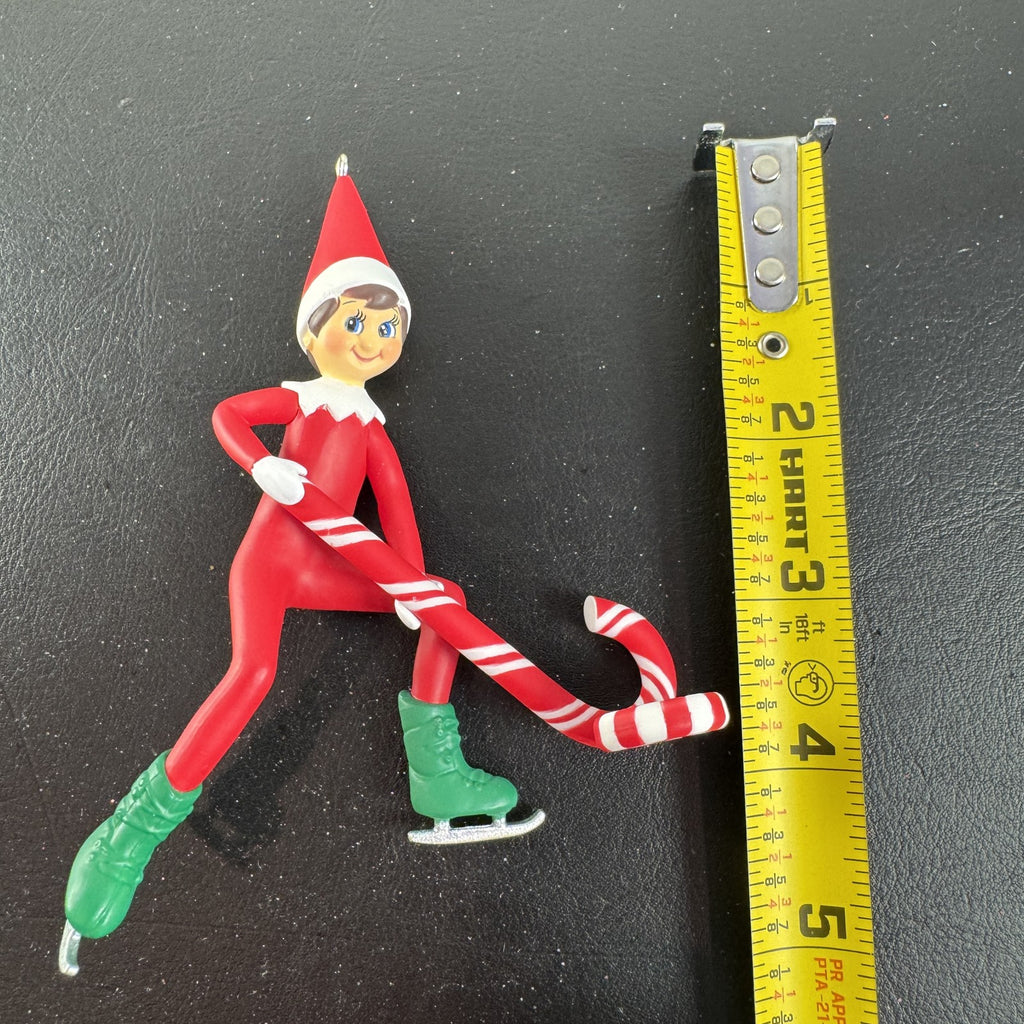 Hallmark Keepsake 2021 Elf on the Shelf ice skating Christmas ornament holding a peppermint candy cane in original box