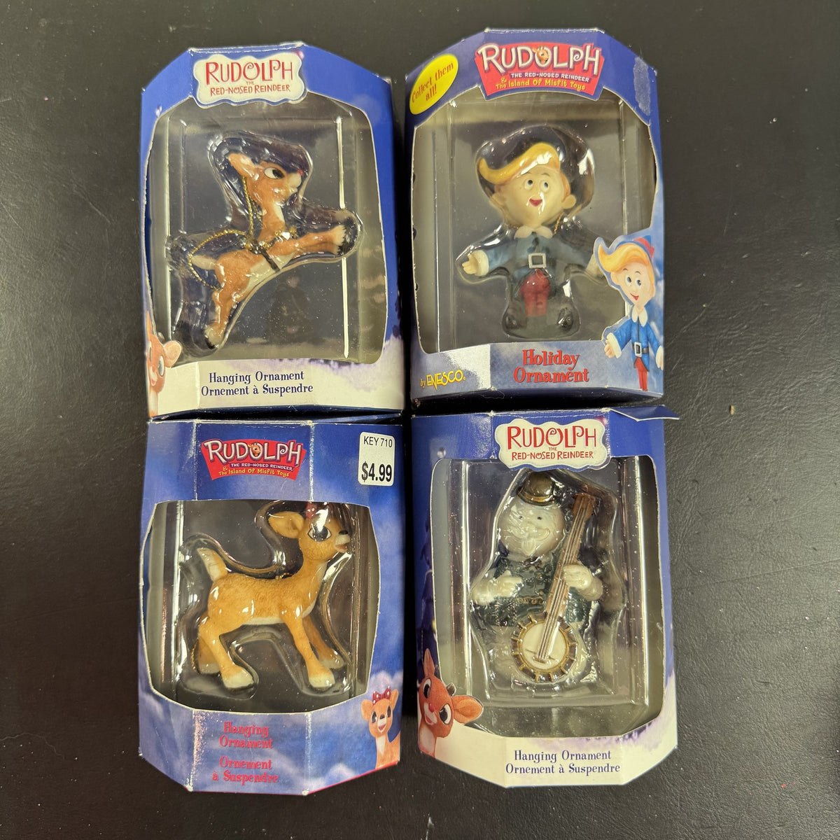 Enesco 2000 Rudolph the Red-Nosed Reindeer set of four Christmas ornaments in original display boxes.