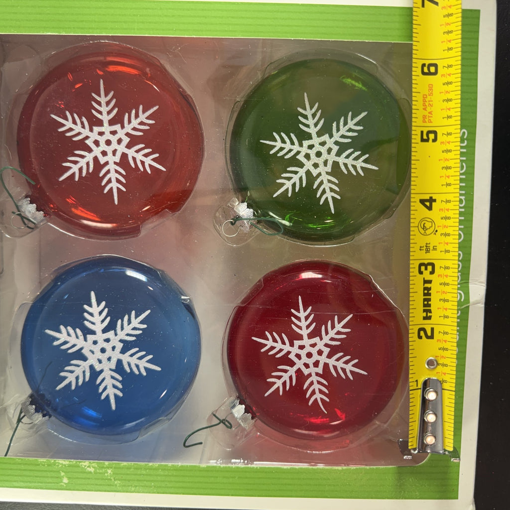 Set of 8 Target Be Merry 2008 glass snowflake Christmas ornaments in red, green, and blue original retail packaging.