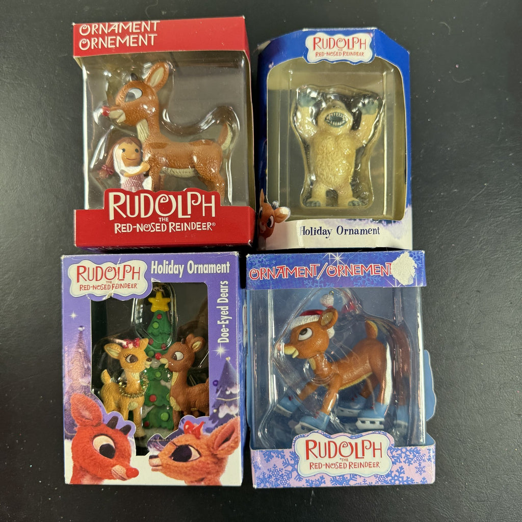 Set of 4 Enesco Rudolph the Red-Nosed Reindeer resin Christmas ornaments in original window boxes.