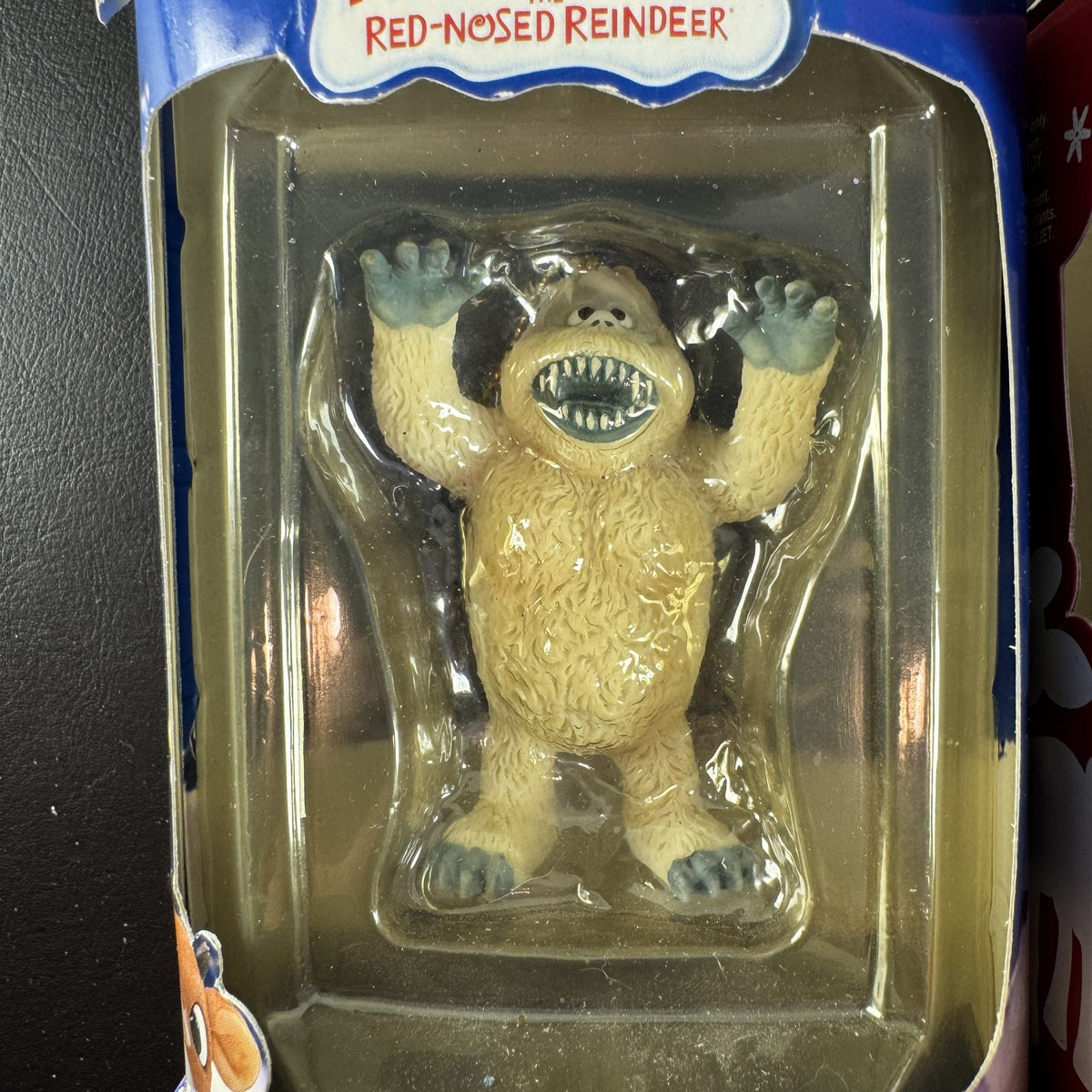Set of 4 Enesco Rudolph the Red-Nosed Reindeer resin Christmas ornaments in original window boxes.
