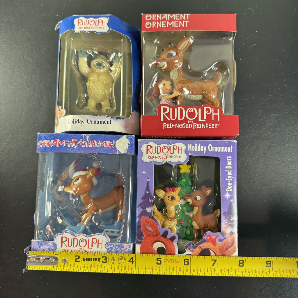 Set of 4 Enesco Rudolph the Red-Nosed Reindeer resin Christmas ornaments in original window boxes.