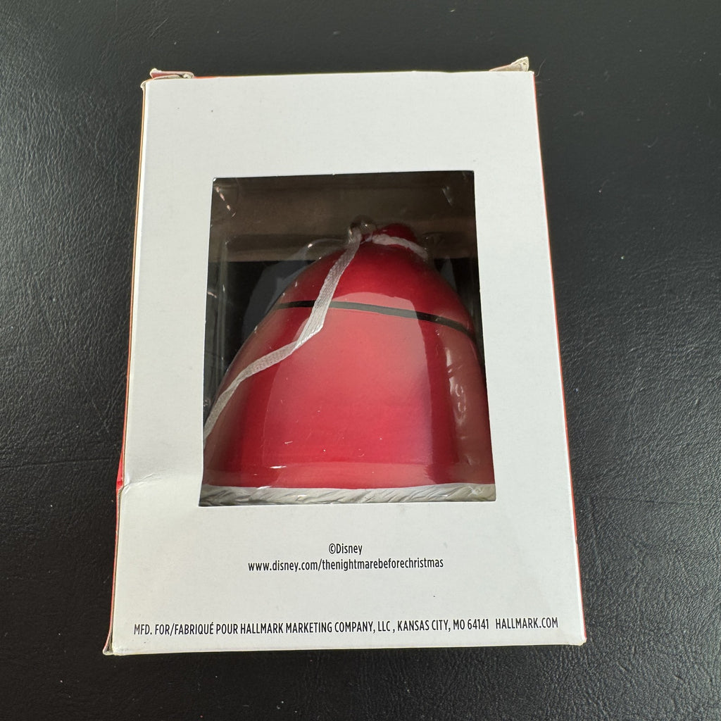 Hallmark Disney Nightmare Before Christmas Sandy Claws resin ornament in red suit holding a candy cane in original box