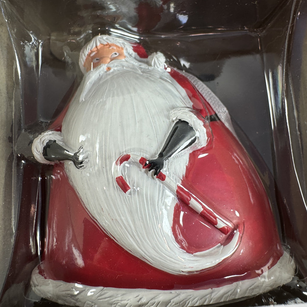 Hallmark Disney Nightmare Before Christmas Sandy Claws resin ornament in red suit holding a candy cane in original box