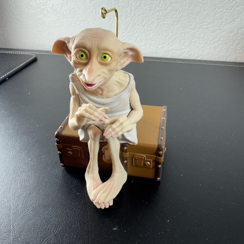 Hallmark Keepsake 2023 Harry Potter Dobby the House-Elf sound and motion Christmas ornament on trunk