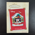 2002 Hallmark Keepsake Disney Snuggle Time light-up Christmas ornament featuring Mickey and Minnie Mouse fireside in box