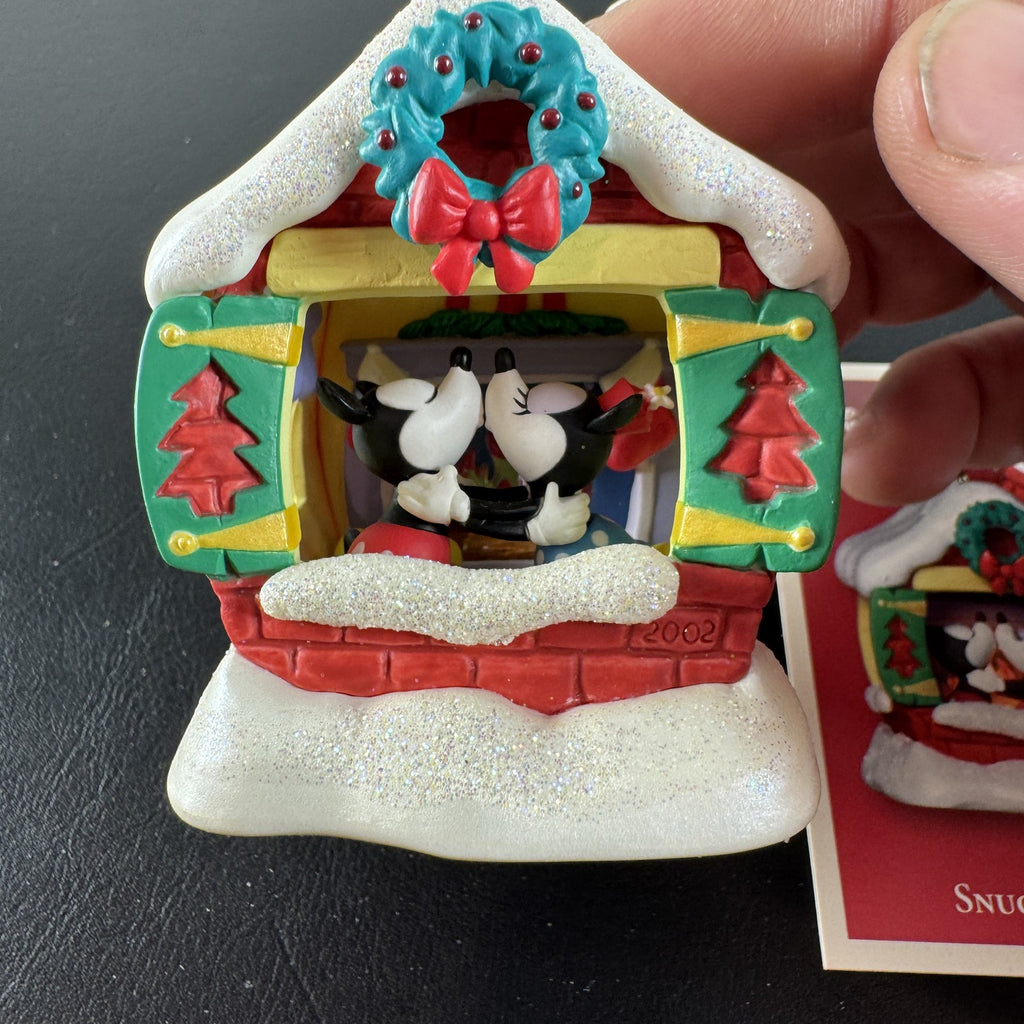 2002 Hallmark Keepsake Disney Snuggle Time light-up Christmas ornament featuring Mickey and Minnie Mouse fireside in box