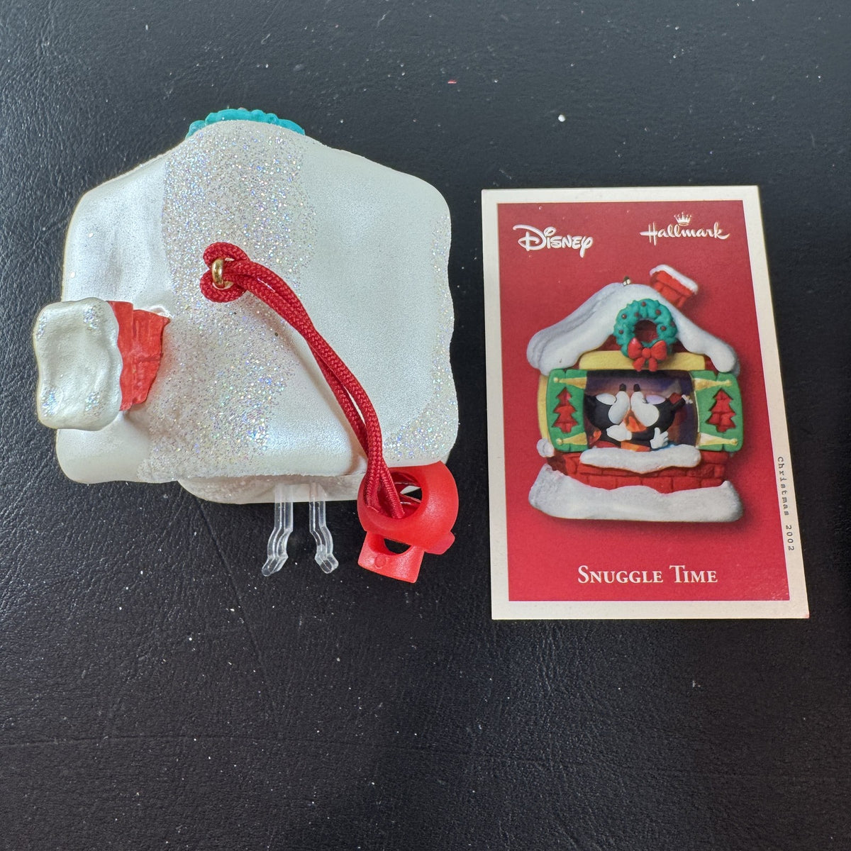 2002 Hallmark Keepsake Disney Snuggle Time light-up Christmas ornament featuring Mickey and Minnie Mouse fireside in box