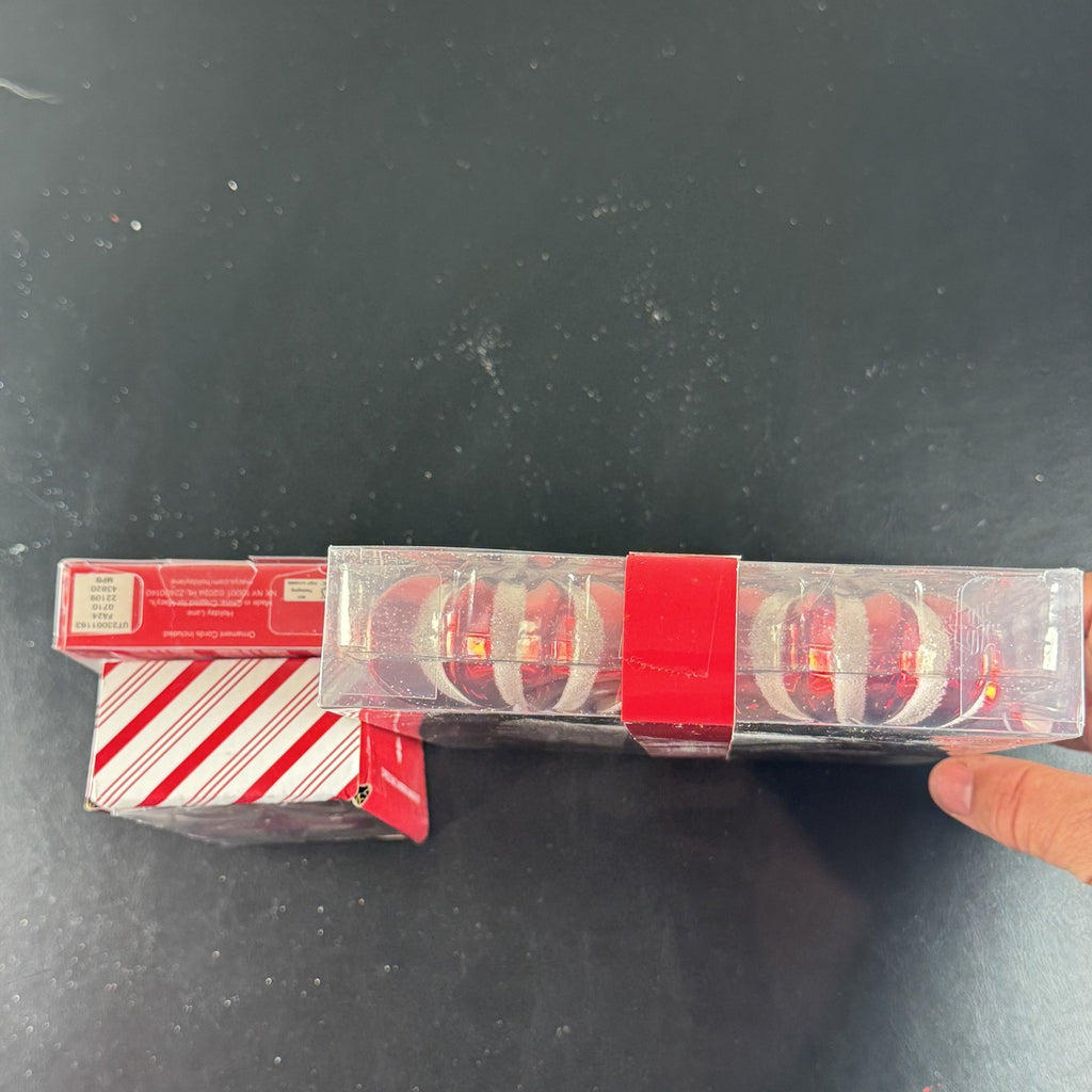Holiday Lane Peppermint Place red and white swirl Christmas ornaments and salt and pepper shaker set in packaging